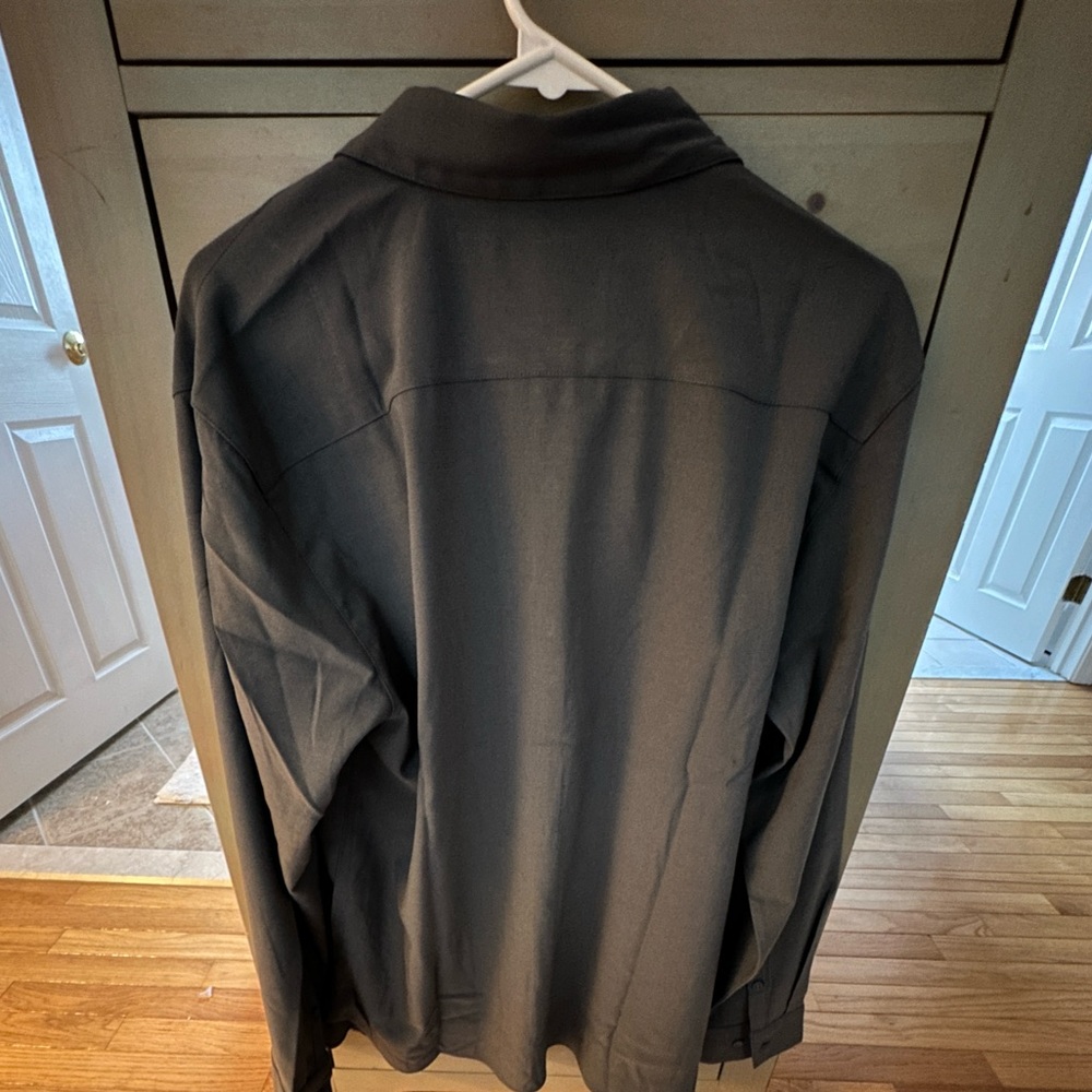 Brand new BYLT shirt without tags.  Silver Gray.